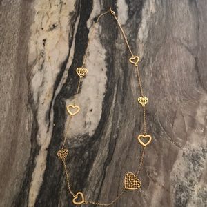 Coach gold signature 36' necklace.